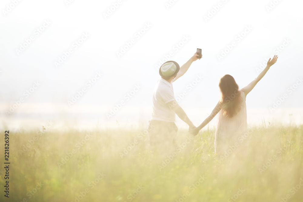 Couple man and pregnant girl in the field Couple man and pregnant girl in the field