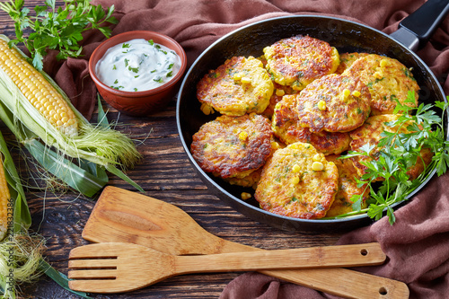 Canvas Print fried corn fritters in a skillet
