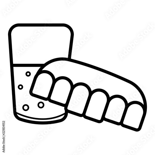 denture in water glass