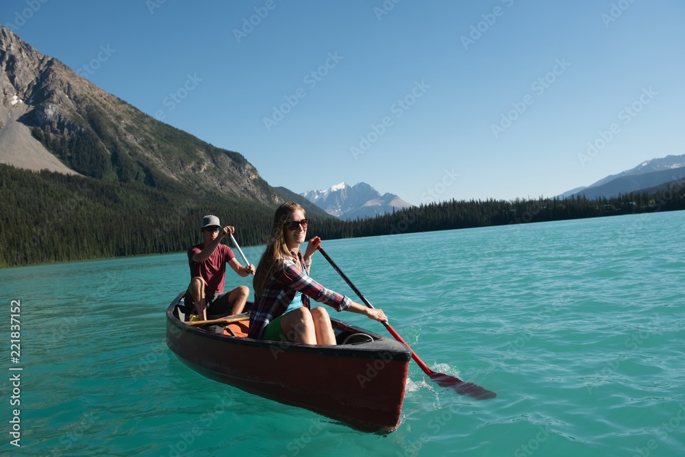 Couple boating on river Couple boating on river