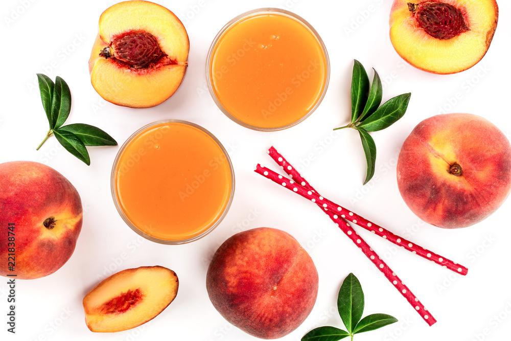 peach juice with leaves isolated on white background. Top view. Flat lay pattern peach juice with leaves isolated on white background. Top view. Flat lay pattern