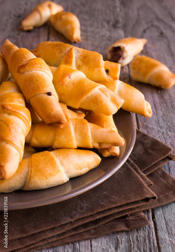 Homemade croissants with chocolate, delicious sweet rolls 