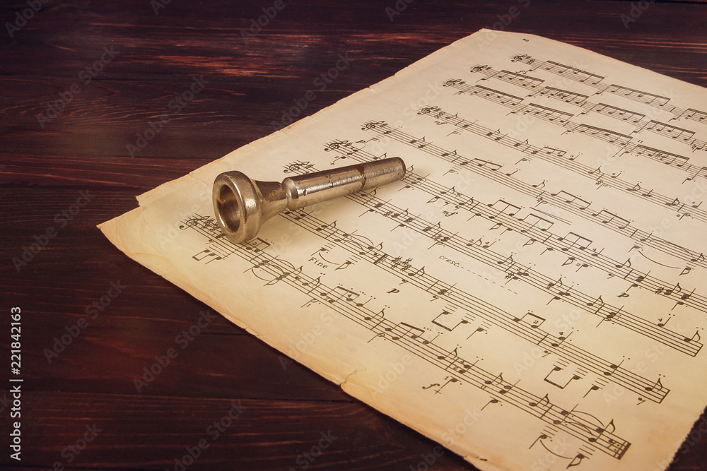 Ταπετσαρία the notes and the mouthpiece from woodwind instruments