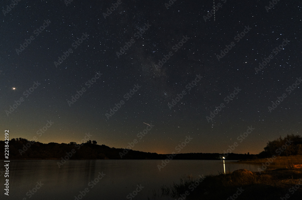 Povoa e Meadas dam at night. Astrophotography in Castelo de Vide, Portugal Povoa e Meadas dam at night. Astrophotography in Castelo de Vide, Portugal