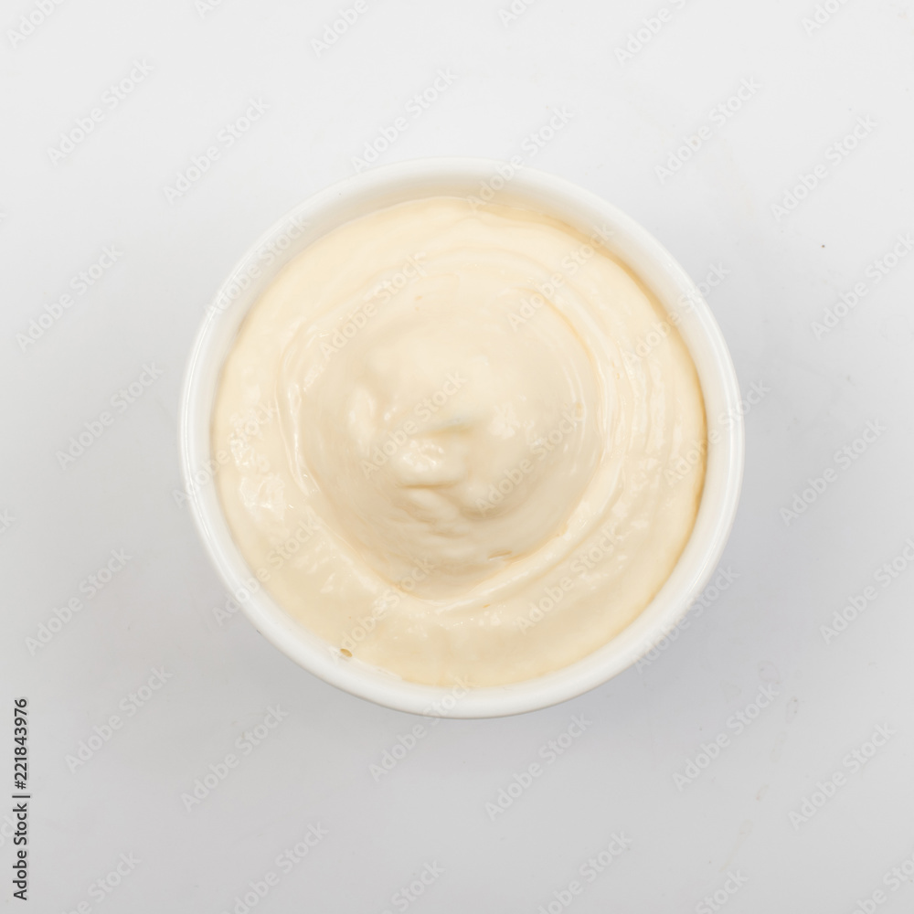 Olive Mayonnaise or Mayo Sauce in Small White Bowl Close Up Olive Mayonnaise or Mayo Sauce in Small White Bowl Close Up