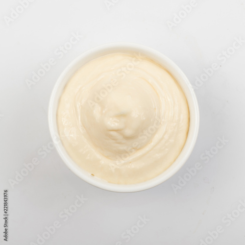 Olive Mayonnaise or Mayo Sauce in Small White Bowl Close Up