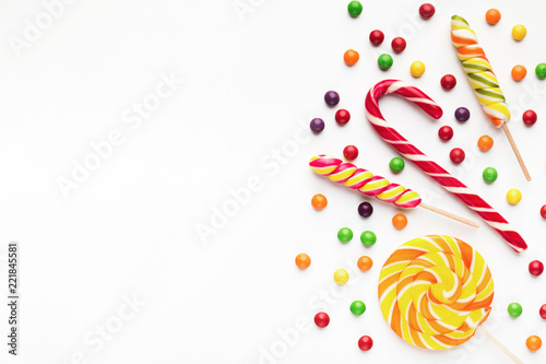 Colorful holiday background with candies and bonbons