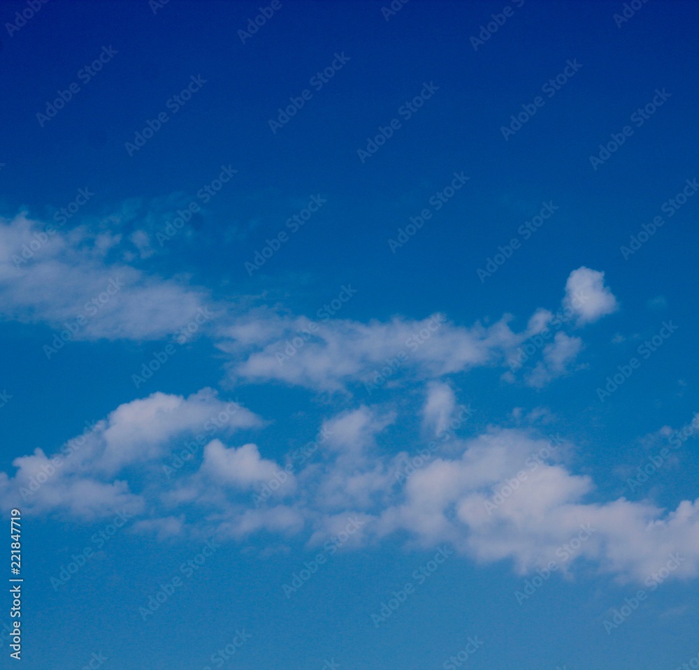 The thin white cloudscape in the bright blue sky. The thin white cloudscape in the bright blue sky.