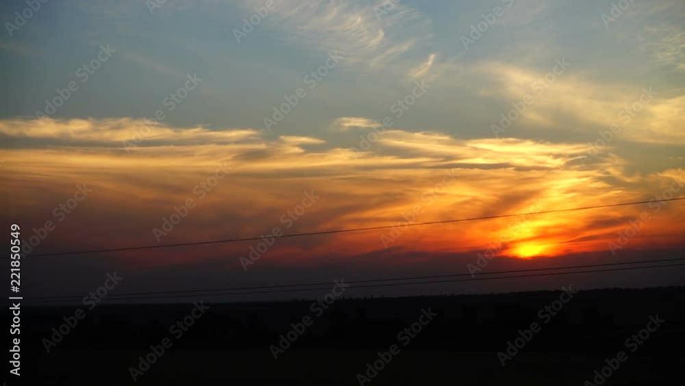 The movement of the train at a sunset. Shooting in the movement. The movement of the train at a sunset. Shooting in the movement.