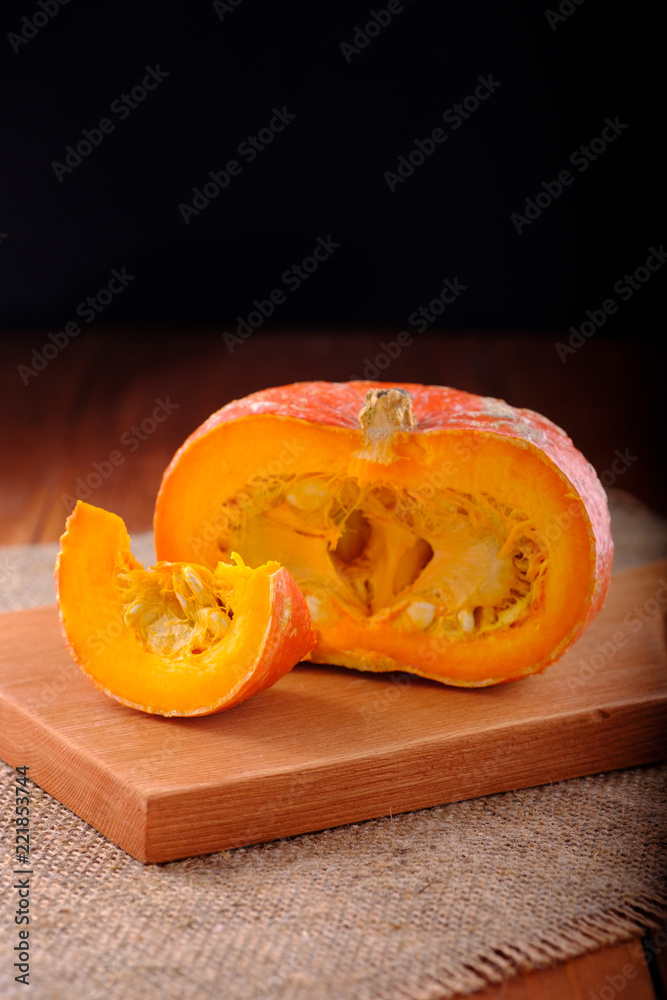 Fresh organic pumpkins. Rustic style, wooden background
