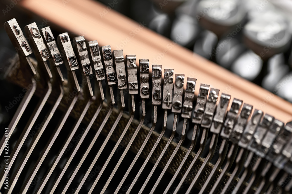 Obraz premium Retro typewriter in studio. Macro close up.