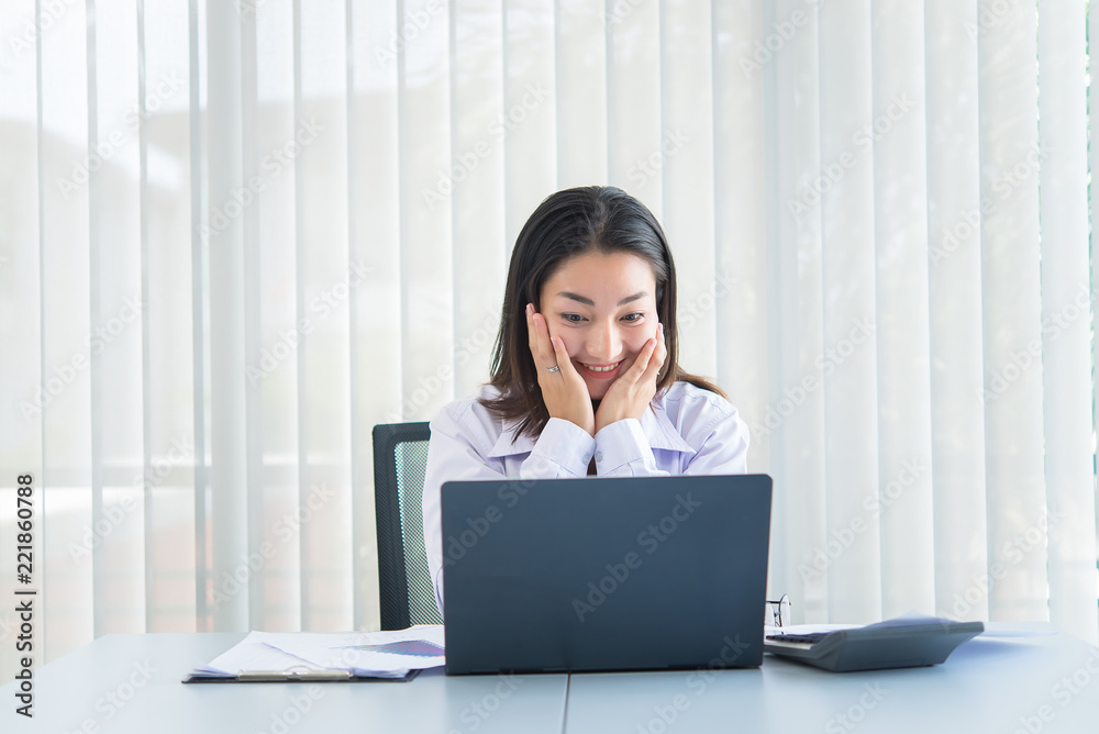 Asian business woman happy in a office,Worker success from work,Thailand people,Happiness girl concept Asian business woman happy in a office,Worker success from work,Thailand people,Happiness girl concept