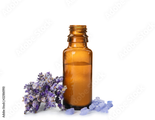 Fototapeta Naklejka Na Ścianę i Meble -  Bottle with aromatic lavender oil on white background