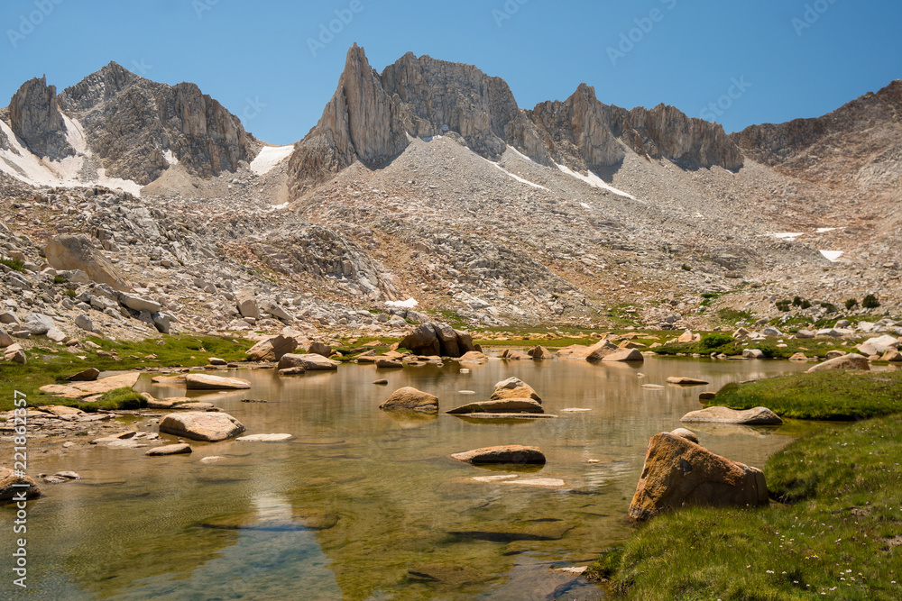 Quiet lake in the mountain backcountry of the Sierra Nevada in California