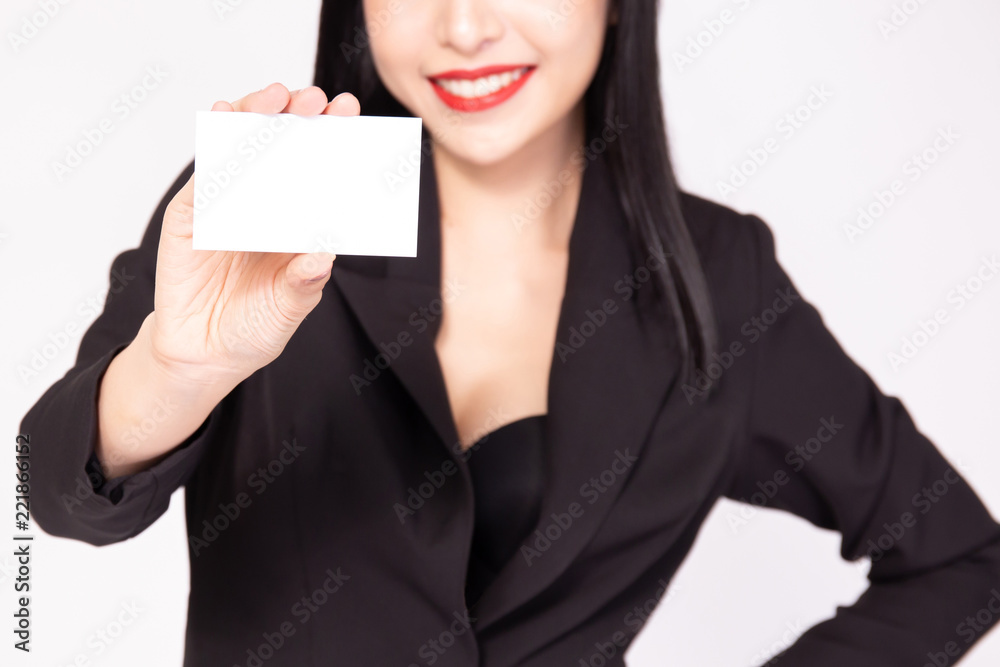 Close-up of happy smiling business woman holding an empty placard size paper - ready to insert commercial advertising and text. Close-up of happy smiling business woman holding an empty placard size paper - ready to insert commercial advertising and text.