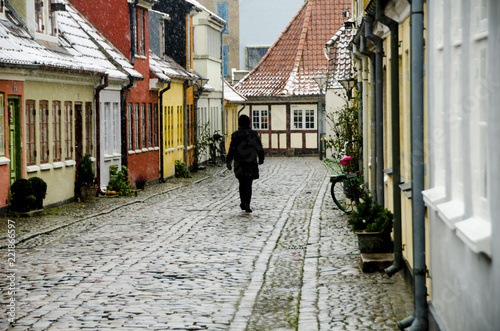 Obraz na plátně Old houses in Hans Christian Andersens quarter in the danish snow weather