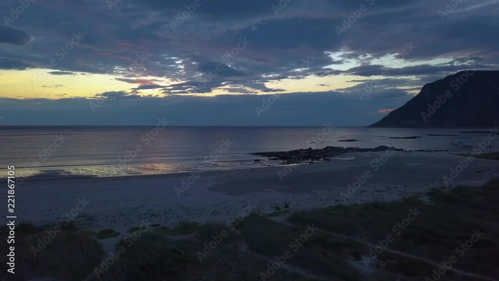 Aerial view of empty beach and beautiful sunset sky. Norway. Lofoten Islands. Aerial view of empty beach and beautiful sunset sky. Norway. Lofoten Islands.