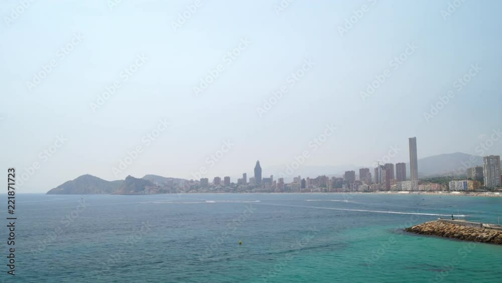 Beautiful timelapse video of motorboats and PWCs moving in the Mediterranean sea and amazing Benidorm skyline in distance. Beautiful timelapse video of motorboats and PWCs moving in the Mediterranean sea and amazing Benidorm skyline in distance.