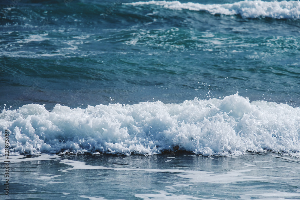 Angry sea waves rolling towards the beach