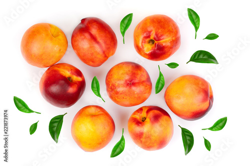 ripe nectarine with leaves isolated on white background. Top view. Flat lay pattern