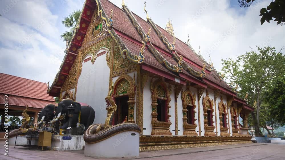 Timelaps of thai temple  at afternoon time with moving of buddhism, location at wat phuket , Pua , Nan , Thailand 