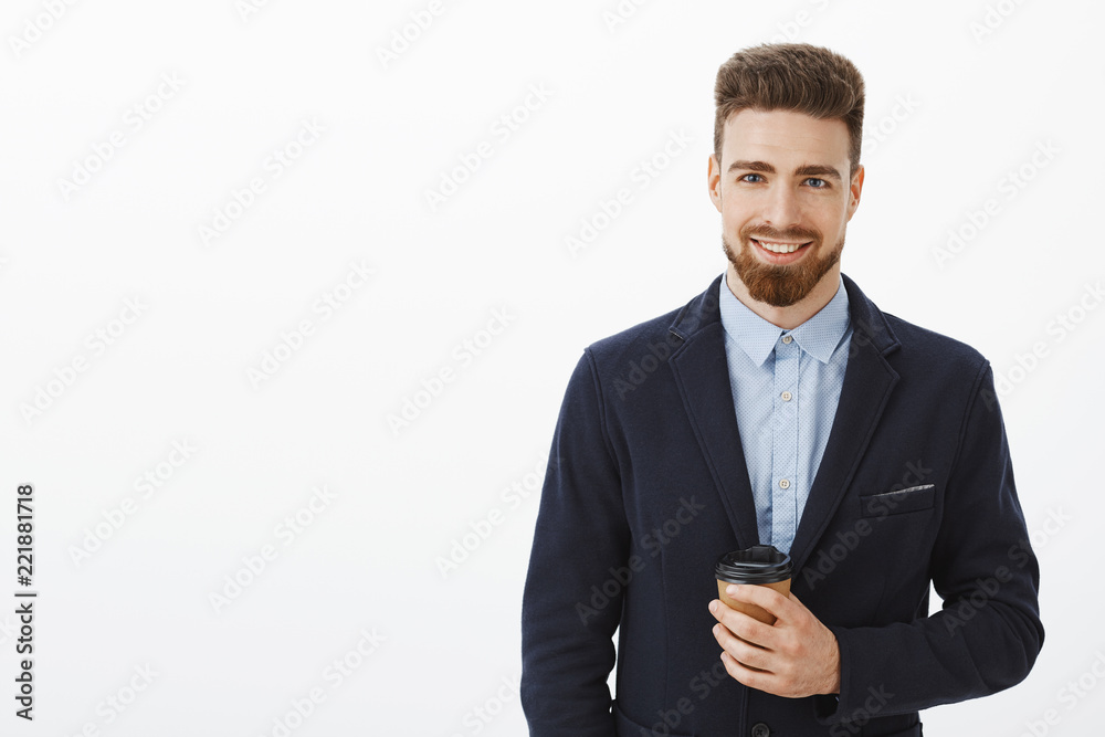 Money likes confidence. Self-assured charismatic and intelligent handsome man with brown hair, beard and blue eyes holding paper cup of coffee smiling happily meeting cute girl after work in cafe Money likes confidence. Self-assured charismatic and intelligent handsome man with brown hair, beard and blue eyes holding paper cup of coffee smiling happily meeting cute girl after work in cafe