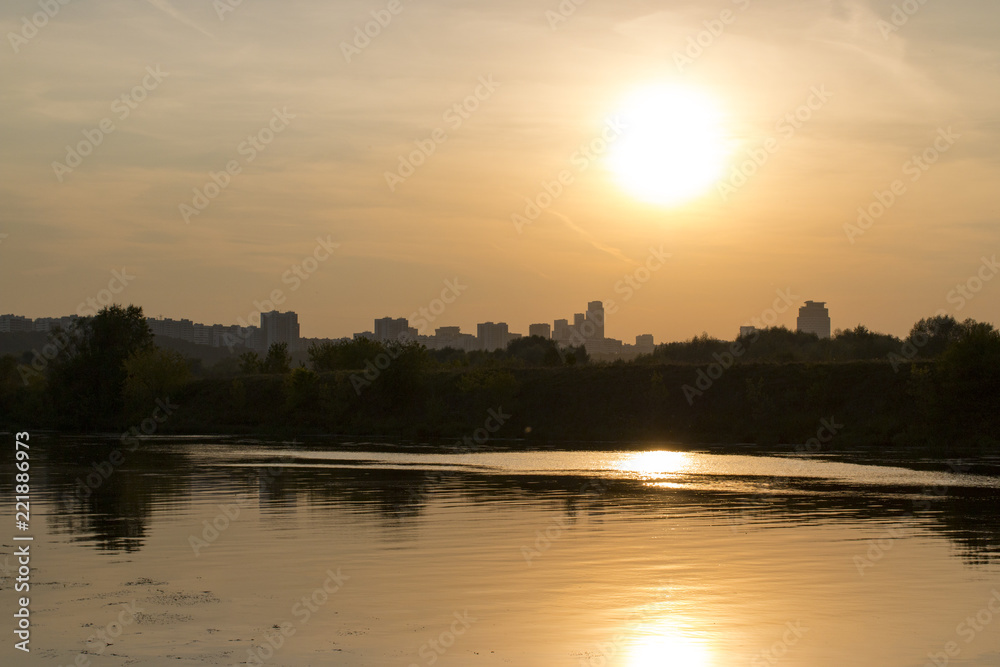 Naklejka premium sunset on the river