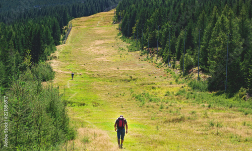 A man climbs the mountains, an excursion to the top in the Czech mountains