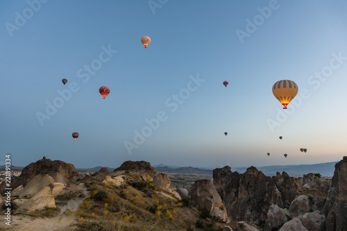 Hot air balloons before sunrise