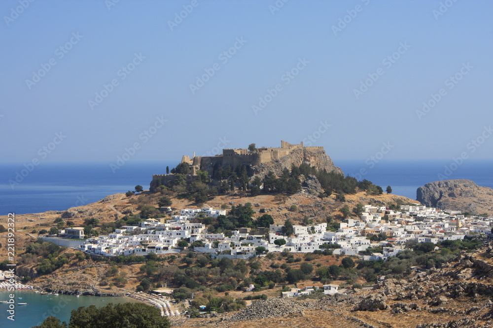 View of village, bay and Acropolis of Lindos (Rhodes, Greece)