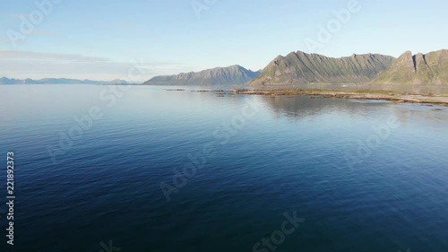 Mountainous coast of Gimsoya island, Gimsoysand in summer. Nordland county, Lofoten archipelago Norway. Tourist attraction. photo