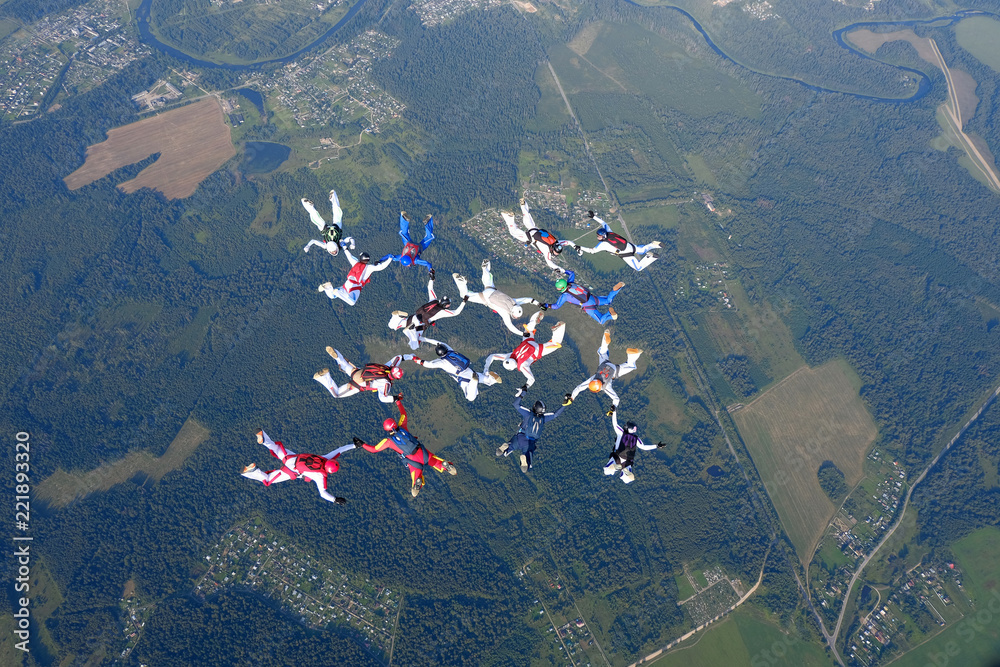 Skydiving. Formation is in the sky.