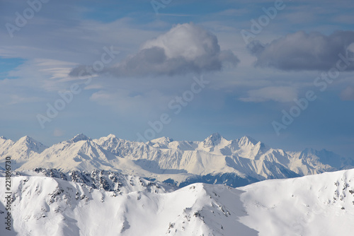 Hochfuegen, Zillertal, Tirol / Austria - January 08, 2018: a view of the beautiful Alpine peaks covered in snow, in the direction of Zugspitze, winter wonderland, landscape photo