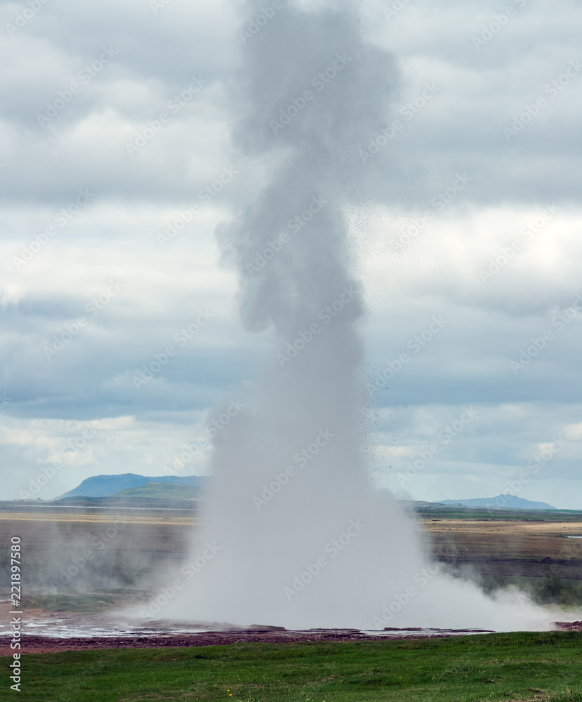 Strokkur Geyser erupting in the Haukadalur geothermal area - Geysir destrict in Iceland.