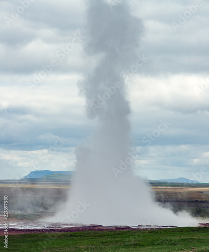 Strokkur Geyser erupting in the Haukadalur geothermal area - Geysir destrict in Iceland.