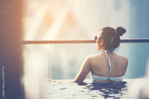 Young woman in a roof top s...