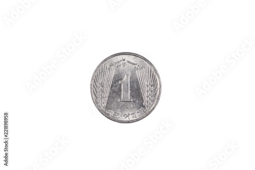 A super macro image of an old 1 Pakistani rupee coin isolated on a white background photo