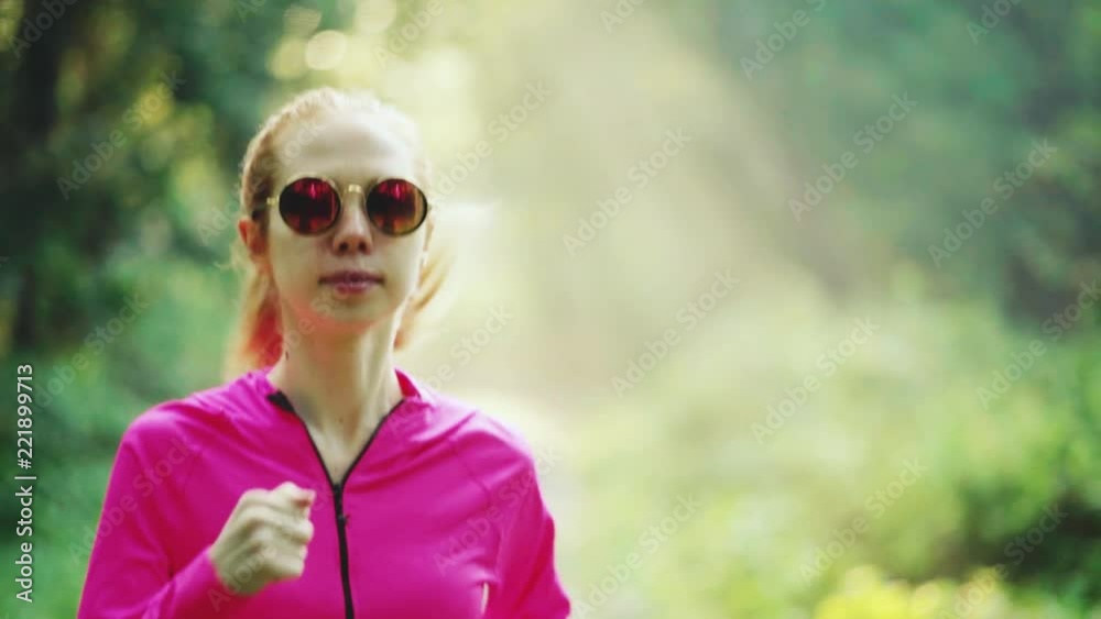 Girl runs through park Girl runs through park