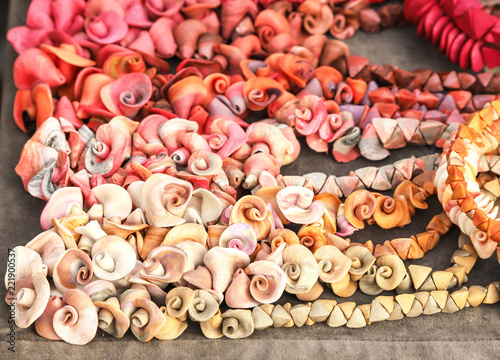 Beads are handmade in the form of flowers © sergzel