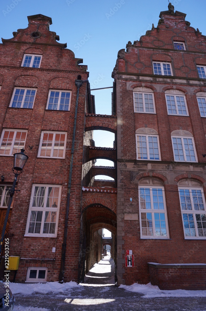 Fototapeta premium Light narrow street Elblag downtown