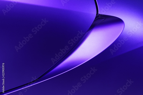 Bodywork of violet sedan, surface of sport car door and fender in ultramodern style, abstract detail of concept racing vehicle 