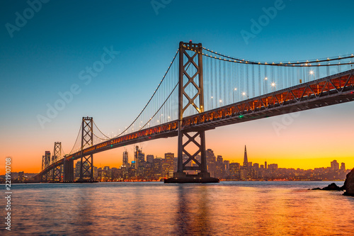 Fototapeta San Francisco skyline with Oakland Bay Bridge at sunset, California, USA