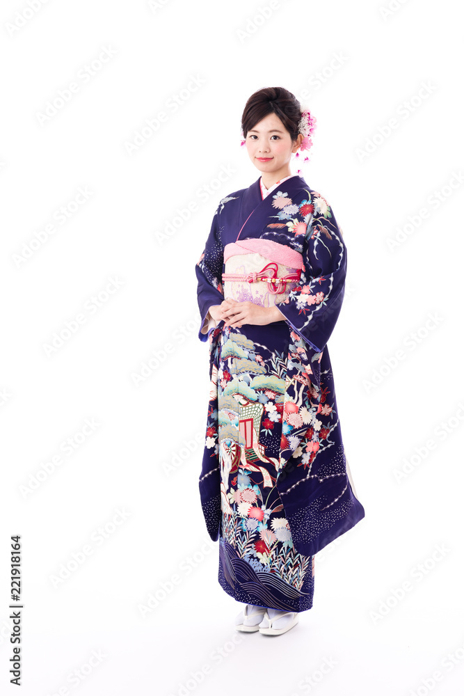portrait of young asian woman wearing purple kimono on white background