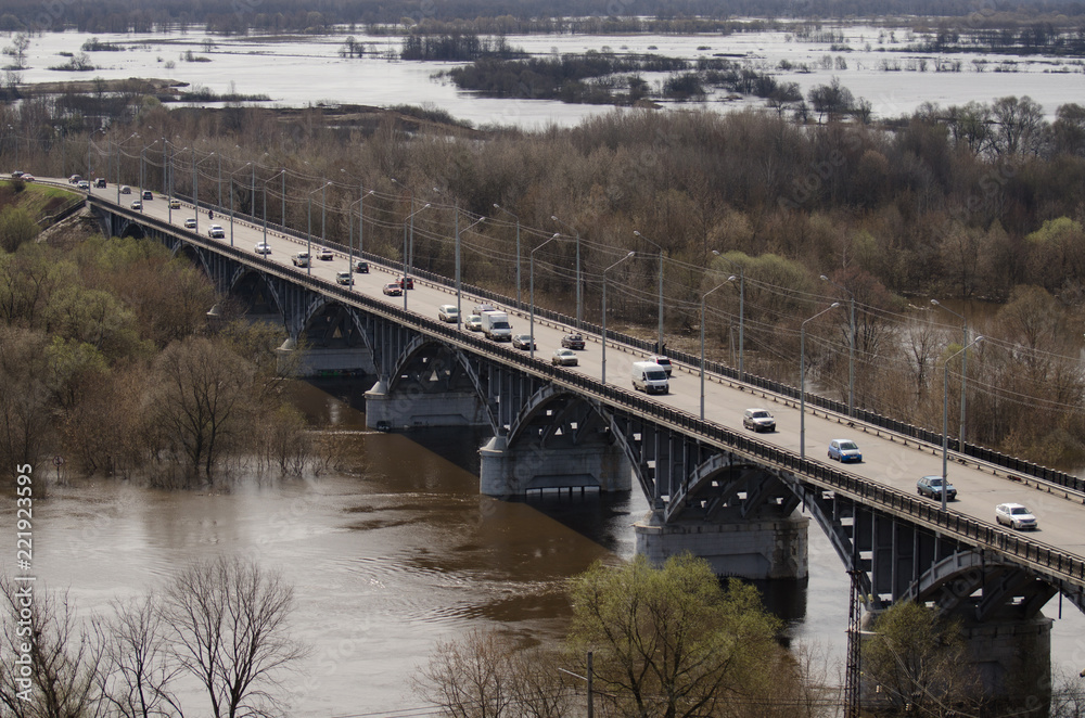 Panoramic view of bridge over river Klyazma in Vladimir city with railroad and green trees