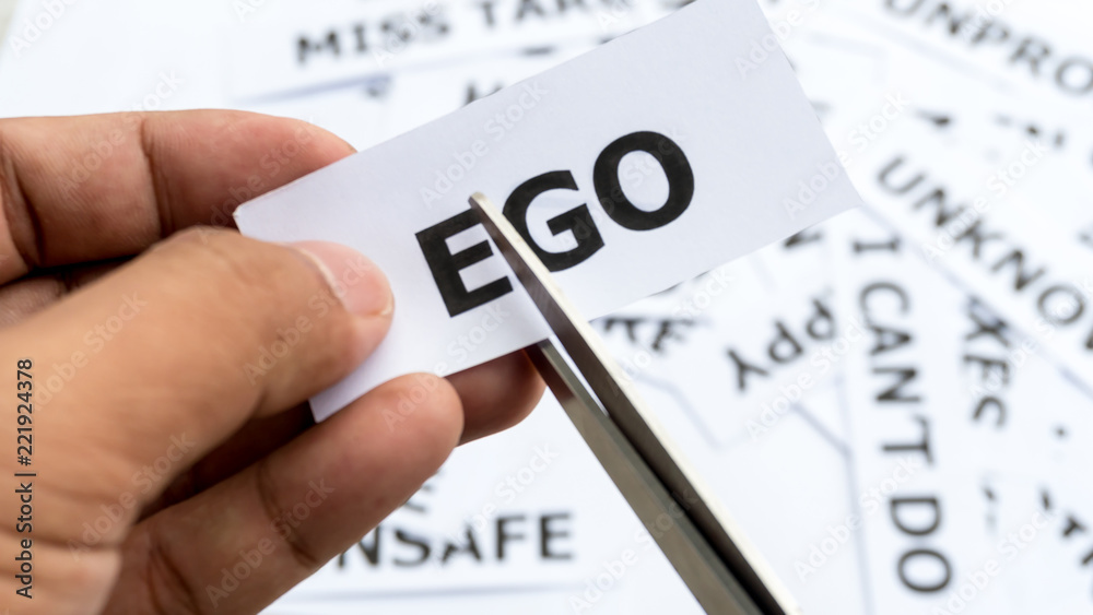 Ego text or word meaning on paper in hand holding Ego text or word meaning on paper in hand holding