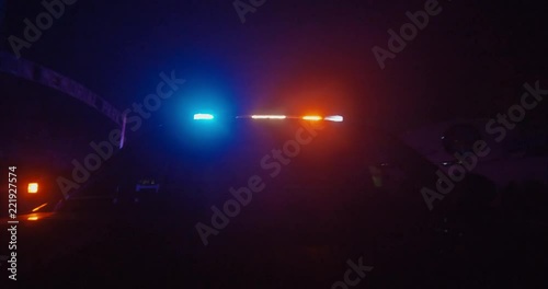 front view of police car from hood with lights on