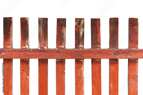 rustic old shabby wooden fence painted in red isolated on white
