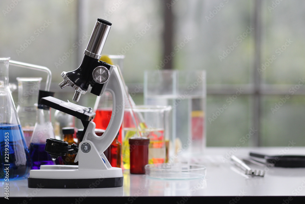 scientist working in the chemistry laboratory / researcher working in the lab analyzing. scientist working in the chemistry laboratory / researcher working in the lab analyzing.