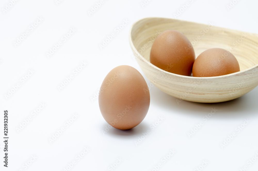 Fresh eggs in the bowl on the background Fresh eggs in the bowl on the background