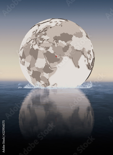 Qatar on globe in water